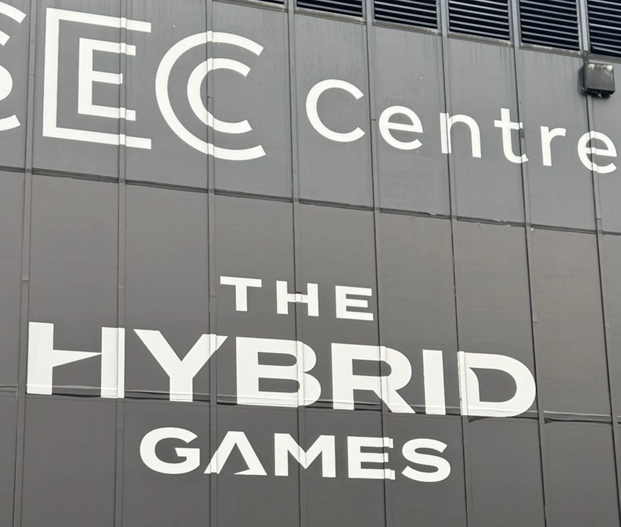 A kettlebell on the floor of a gym.