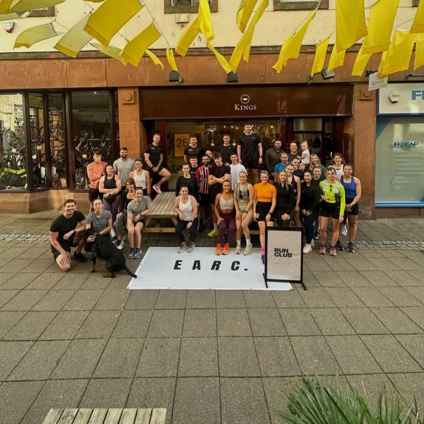 Gym members celebrating after a workout.